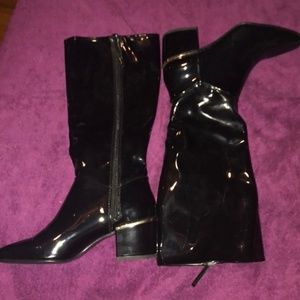 Zara black patent leather boots with gold accent.